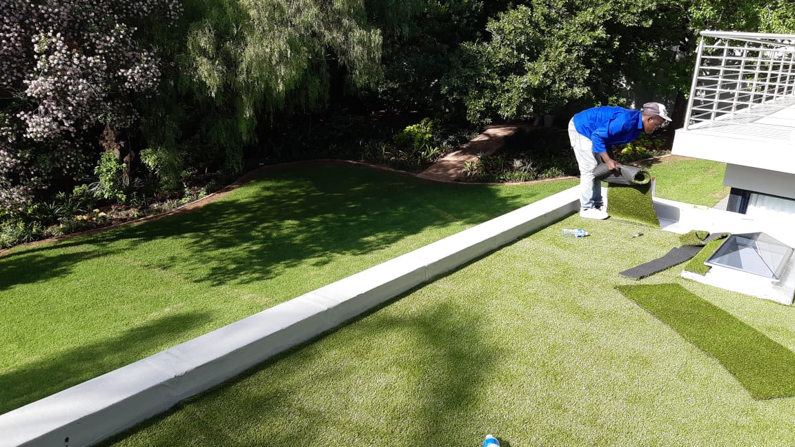 Artificial grass rooftop installation